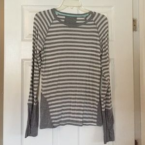 Gray and white striped yoga shirt.