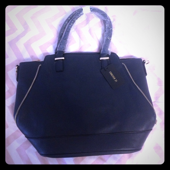 Beautiful navy leather tote with side zippers