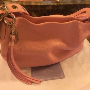 Authentic Coach pink pebble leather handbag.