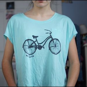 Aqua flowy top with bicycle