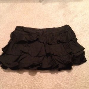 Black ruffled mini skirt
