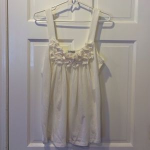 White with ruffles tank top.