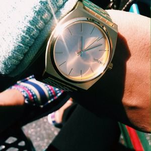 Gold Nixon watch