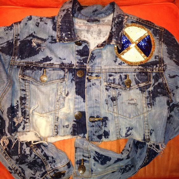 Crop denim jacket with the BMW logo patches.
