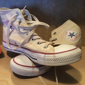 Cream converse high tops