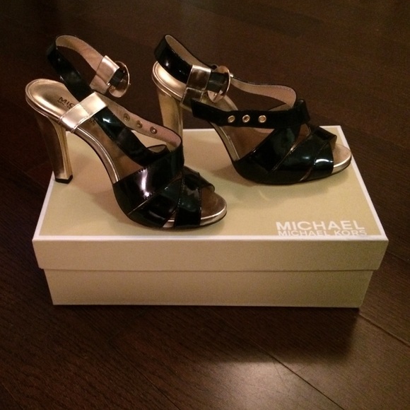 Black and gold patent leather Michael Kors pumps
