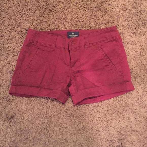 Maroon shorts.
