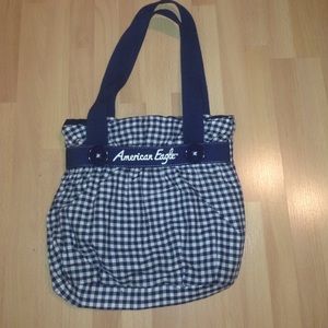 Navy blue and white checkered bag
