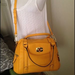 Yellow hand back with shoulder strap