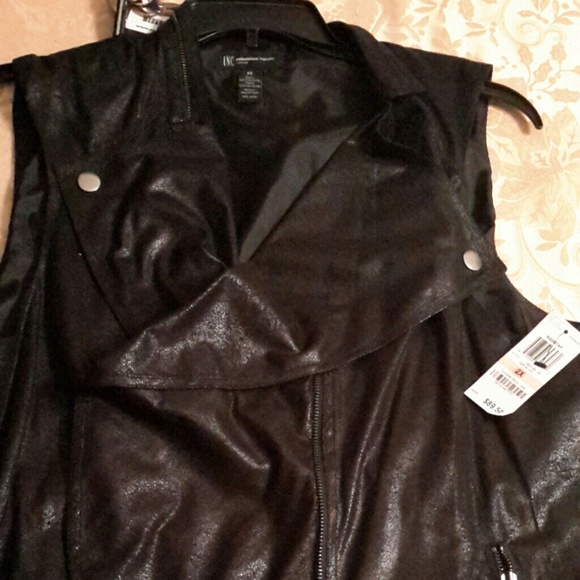 Leather look vest.