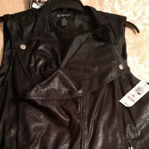 Leather look vest.