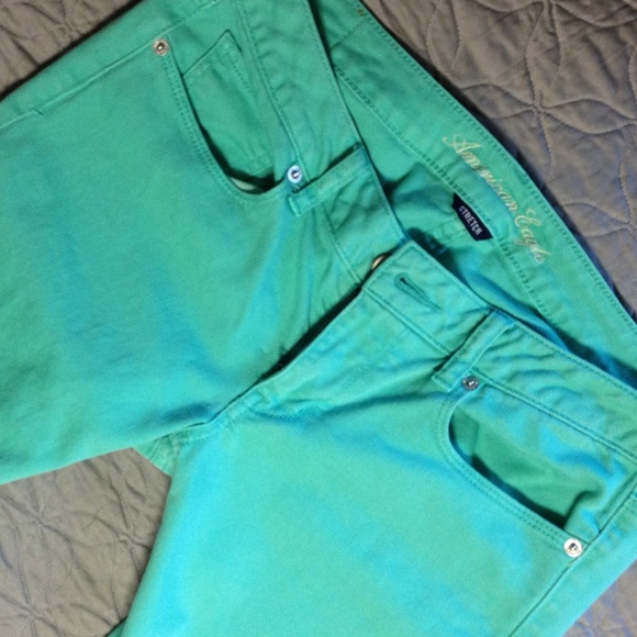 American Eagle green skinny jeans