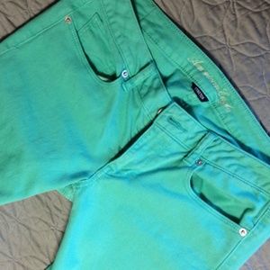 American Eagle green skinny jeans