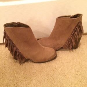 Tan Fringe booties.