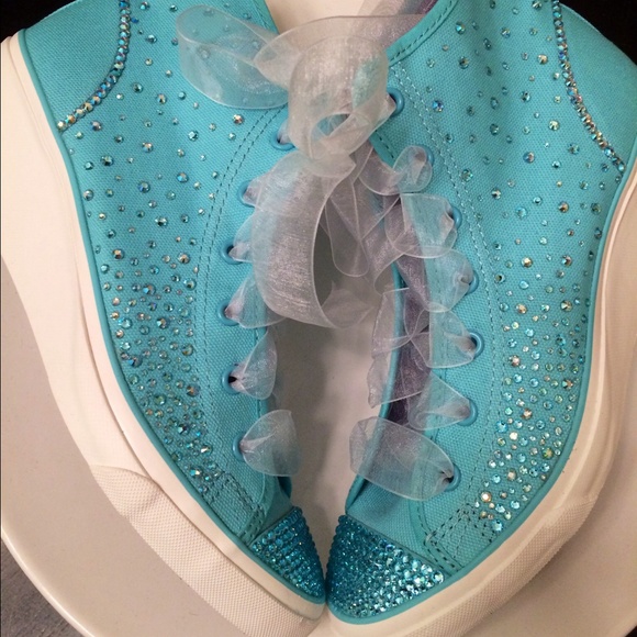 aqua blue high top converse