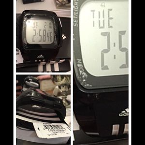 Adidas sports watch black in color. Tells 2 times
