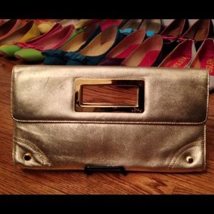 Lilly Pulitzer gold leather clutch.  Carried once!