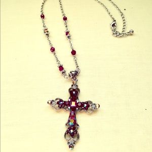Light catching red stoned cross necklace