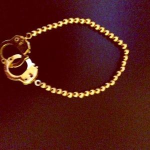 Gold handcuffs bracelet