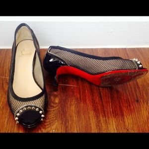 Auth. Christian Louboutin spike-toe fishnet heels