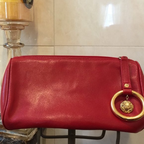 Gucci barrel red leather clutch