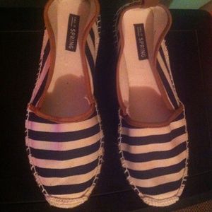 White and blue striped shoes. From call it springs