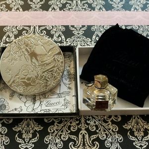 Silver Flora by Gucci compact mirror