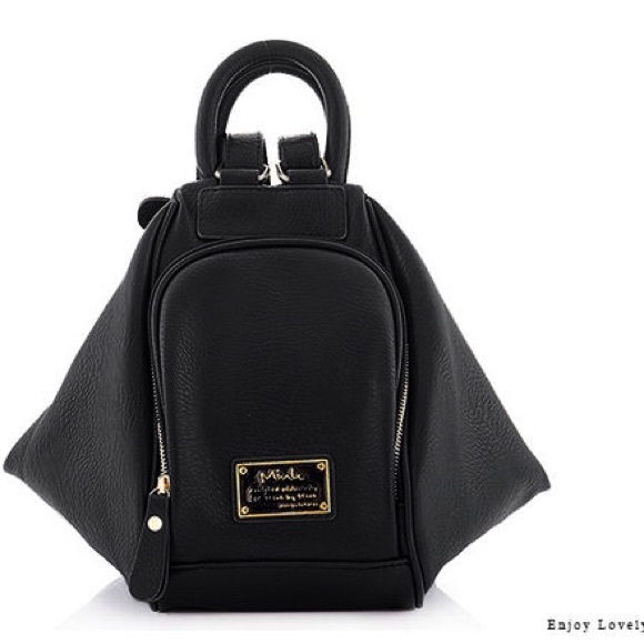 Convertible black faux leather purse