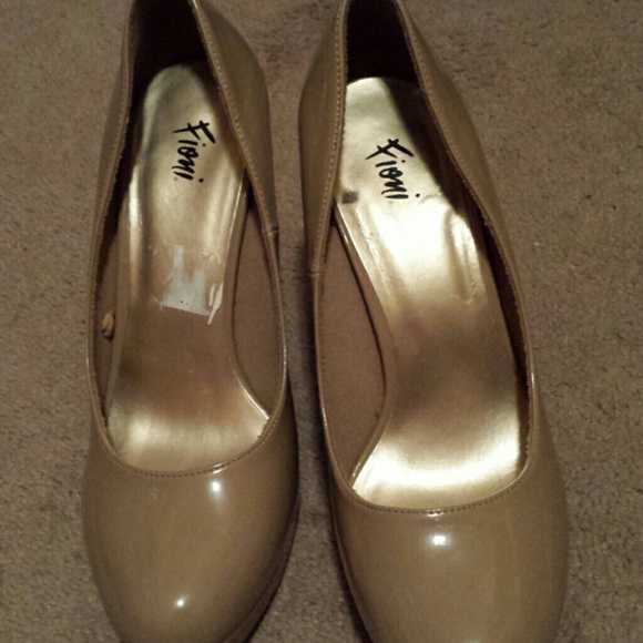 Nude colored pumps
