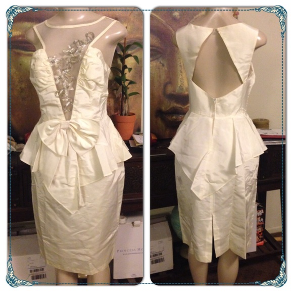 Dresses & Skirts - Peplum Karen Okada Dress