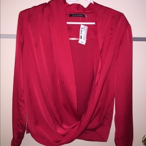 foreign exchange red blouse