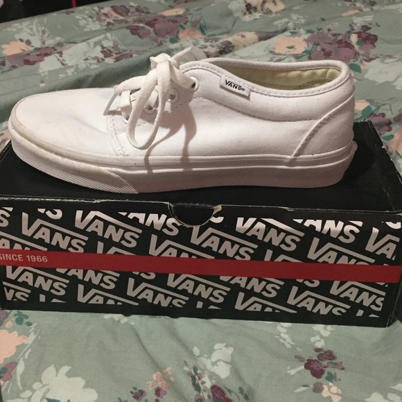 White vulcanized Vans