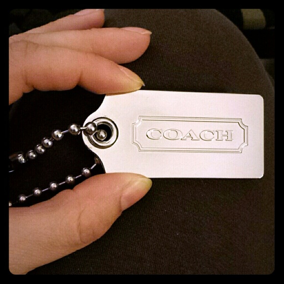 Large silver Coach hangtag