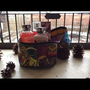 Cosmetic bag with 4 Bath & Bodyworks products