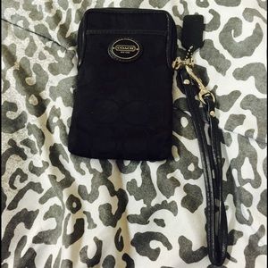 Black wrist coach wallet