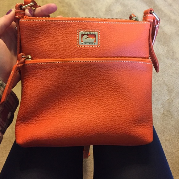 Dooney and Burke bright orange cross body purse