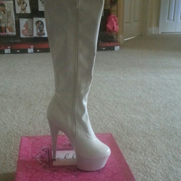 White knee high boots