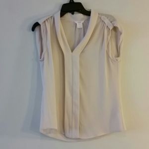 Sleeveless cream vneck