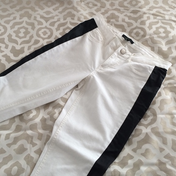 White skinny jeans with black stripe down sides
