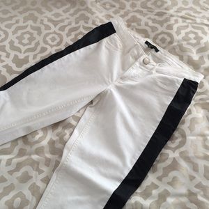 White skinny jeans with black stripe down sides
