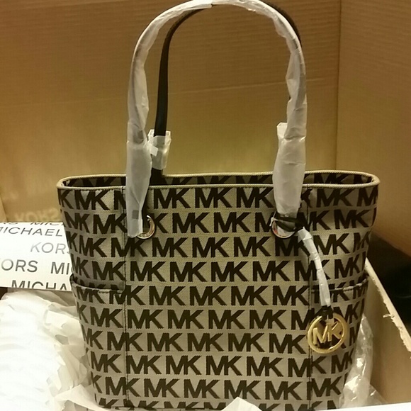 Michael kors gold and black bag **authentic** used