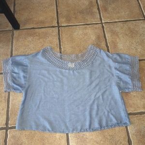 Francesca's blue top