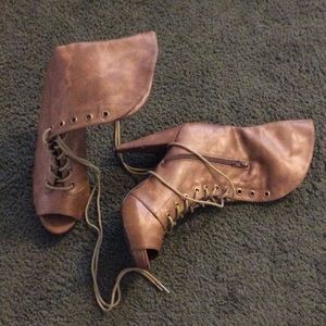 Zip up tie up leap toe heels