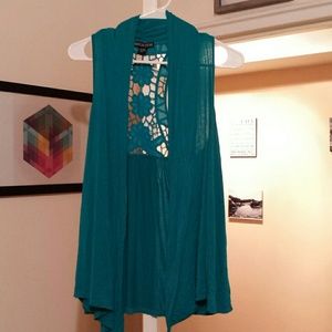 Long teal vest