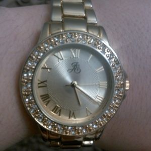 Gold painted stainless steal watch