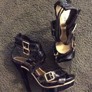 Black and gold  pat and leather BEBE shoes