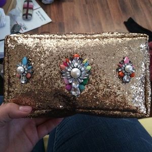Golden makeup bag