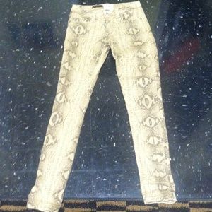 Snake print skinny jeans