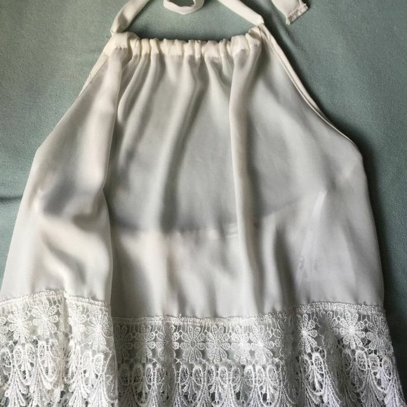 Sheer white tank ties at neck
