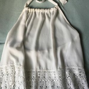 Sheer white tank ties at neck